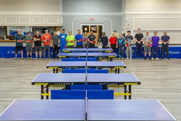 The london table tennis team having fun.
