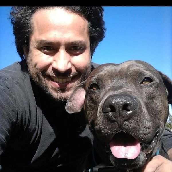 human and dog smiling