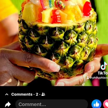 Our World famous Pineapple Water Ice topped with delicious sweet candy