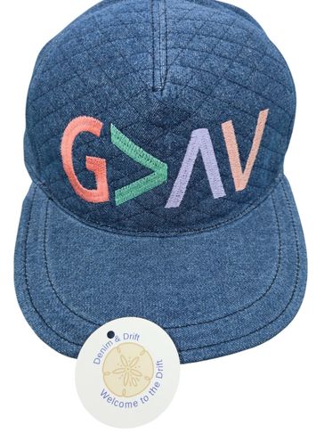 Denim baseball cap with colorful embroidered letters and a tag.