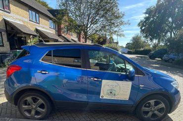 My advertisement for The Pup Hut & Strut on my car