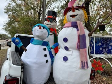 Snowmen Saying Farewell for another season