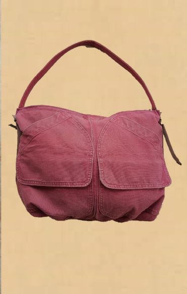 Made from a canvas coat. Front pockets preserved for easy use.