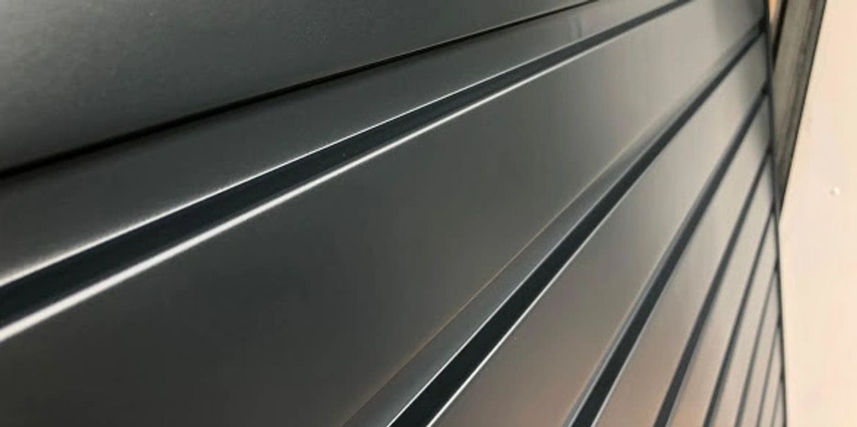 expertly sprayed garage door in ral 9005