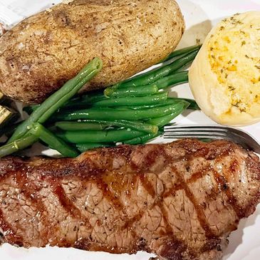 Key Largo Moose Lodge Special Steak Dinner included salad, potato, vegetable and bread.