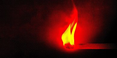 A lit match in the dark