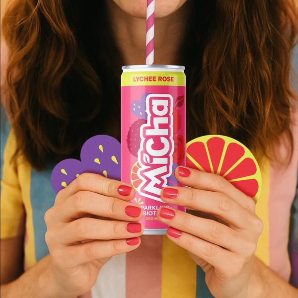 Can of MiCha Lychee Rose with a straw and a lady drinking