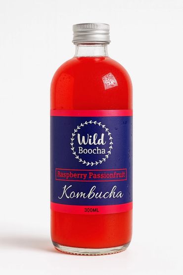A bottle of Wild Boocha Raspberry Passionfruit Kombucha.