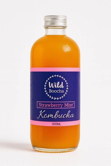A 300ml bottle of Wild Boocha Strawberry Mint Kombucha with a purple label.