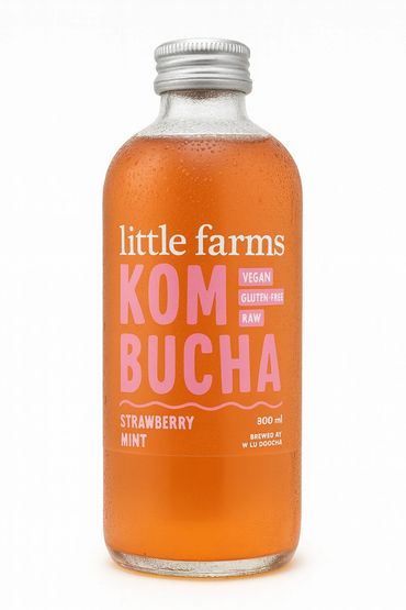 Glass bottle of strawberry mint kombucha from Little Farms.