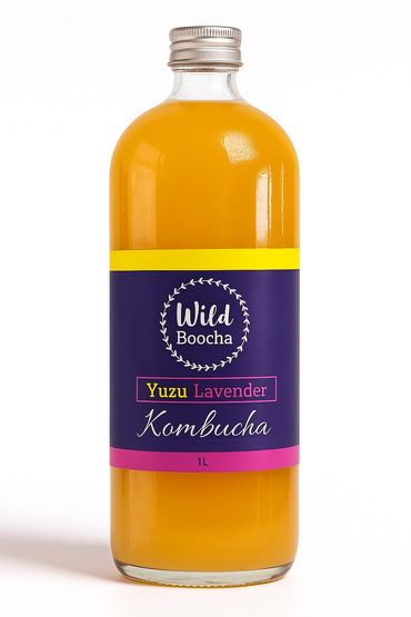 A 1L bottle of Wild Boocha Yuzu Lavender Kombucha with a colorful label.