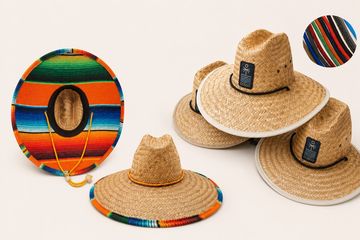 Colorful Mexican sombrero hats and woven straw hats with vibrant patterns.
