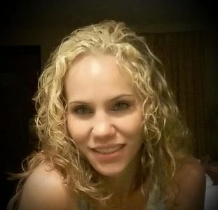 Portrait of a petite blonde female (Torilynn) with curly hair