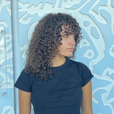 Curly cut on natural curls. Curly Bangs.