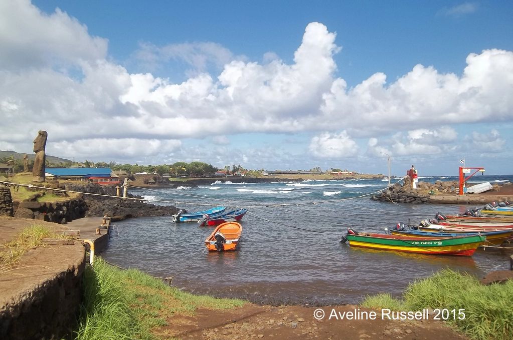 Boats in harbour with Easter Island head