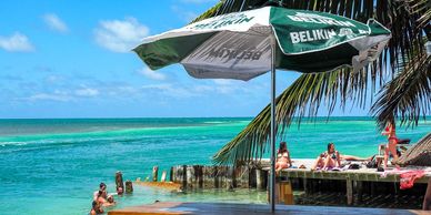 Luxury bedroom inside Casa Lush, a premium San Pedro Belize vacation rental with modern island décor