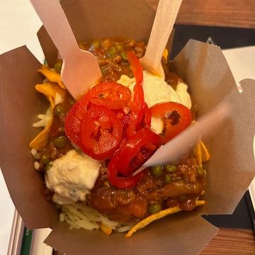 The best nachos come from 8te streetfood, smothered with chilli, jalapenos and sour cream.
