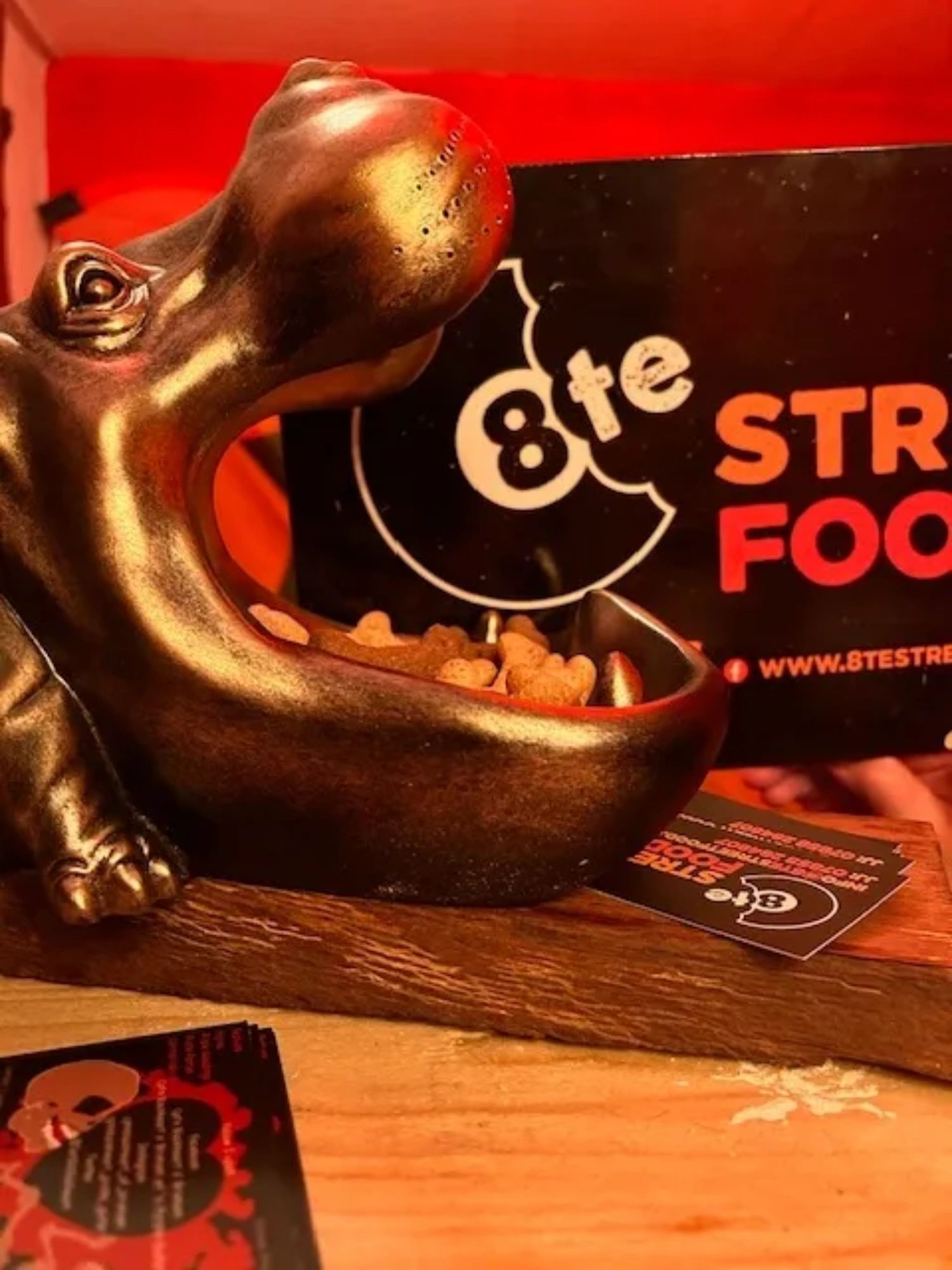 Dogs welcome, we have a hippo mouth full of biscuits
