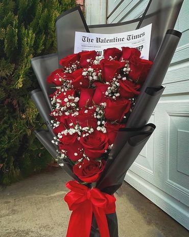 Get this stunning and dreaming standing red roses bouquets for your soulmate