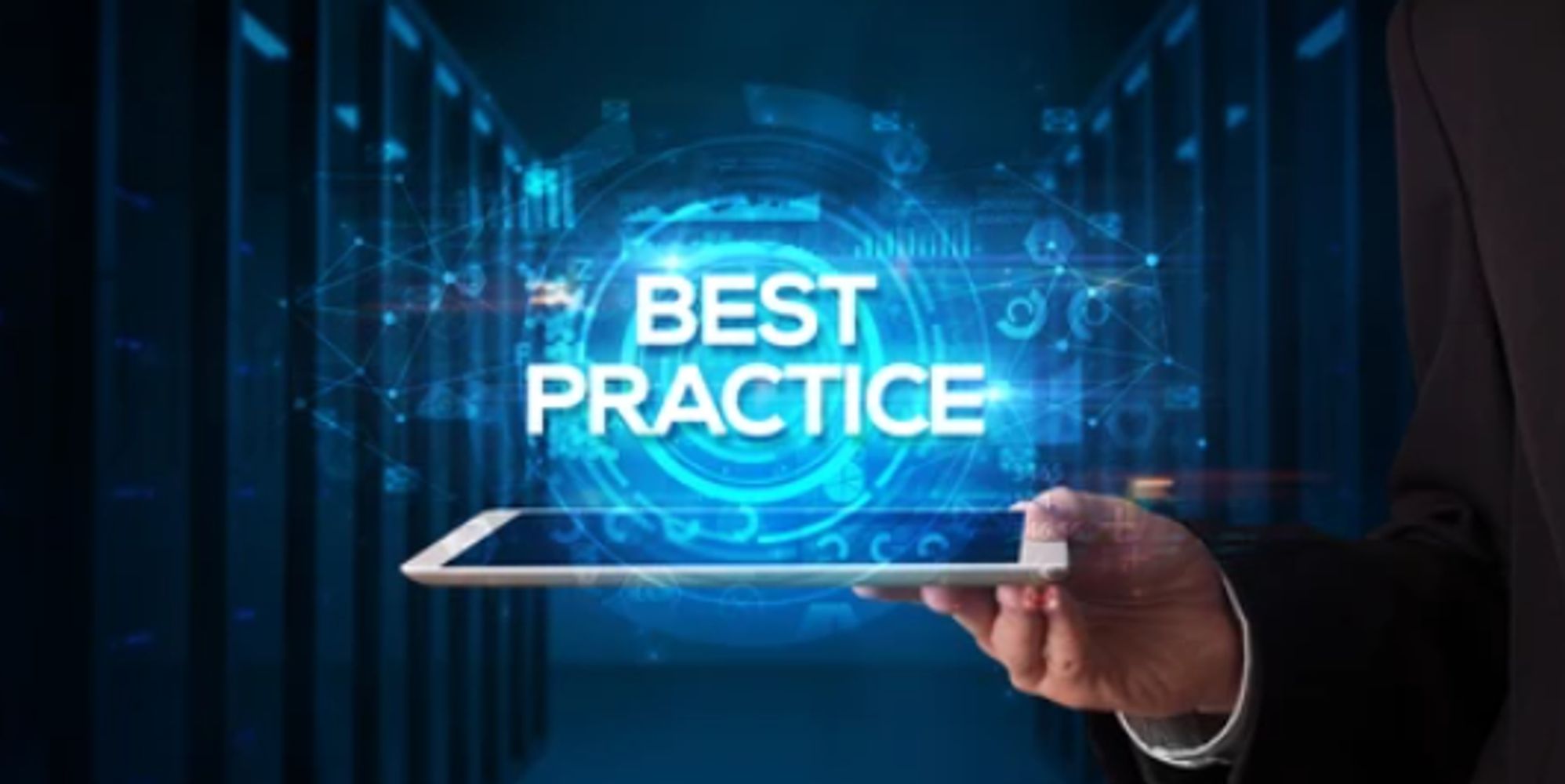 Hand holding tablet with glowing 'Best Practice' text and digital interface.
