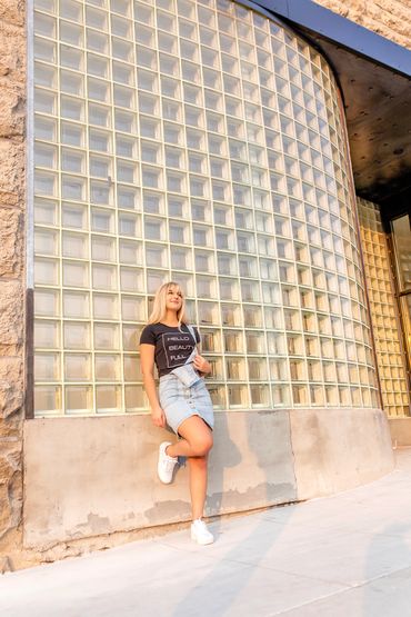 A stylish woman with a hello beauty full t-shirt, promoting inner beauty