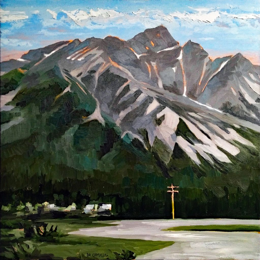 an original painting of a small town at the base of the Rocky Mountains by Laurie De Camillis