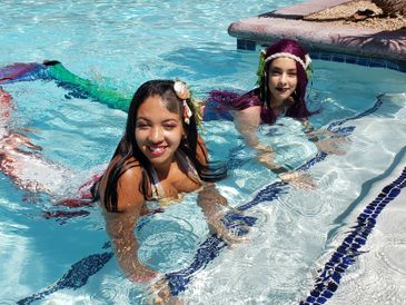 Real swimming mermaids performing at Arizona Biltmore, A Waldorf Astoria Resort.