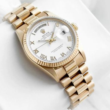 18k Gold Single Quick White Roman Day Date. 18038.