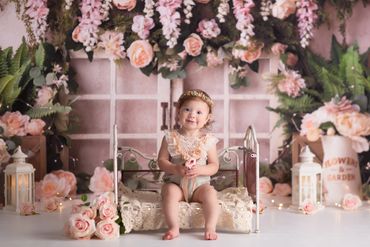 cakesmash little girl floral backdrop one year old photographer