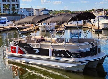 Avalon pontoon boat that holds 12 people on Lake Conroe in Montgomery Texas