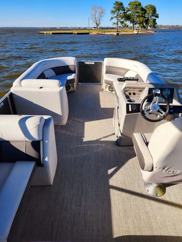 Harris Cruiser 230 at Ayers Island pic from in front of rear seat to front of boat