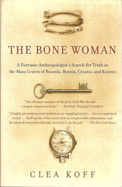 Random House cover of The Bone Woman showing three small bones, old-fashioned key and watch face.
