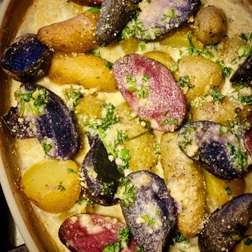 Homemade tricolored potatoes baked in a homemade cream sauce - Chattanooga Catering Cart