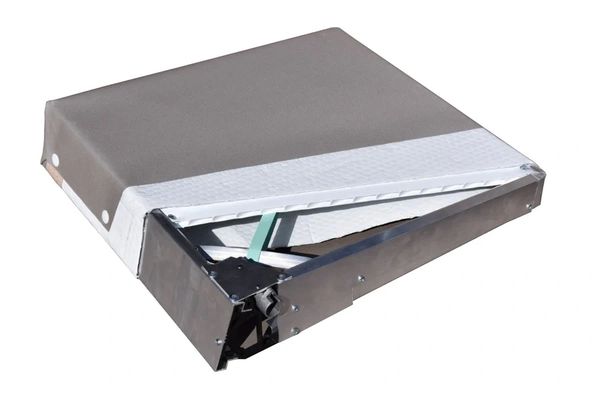 Folded mechanical boat ramp section with metal frame and fabric cover.