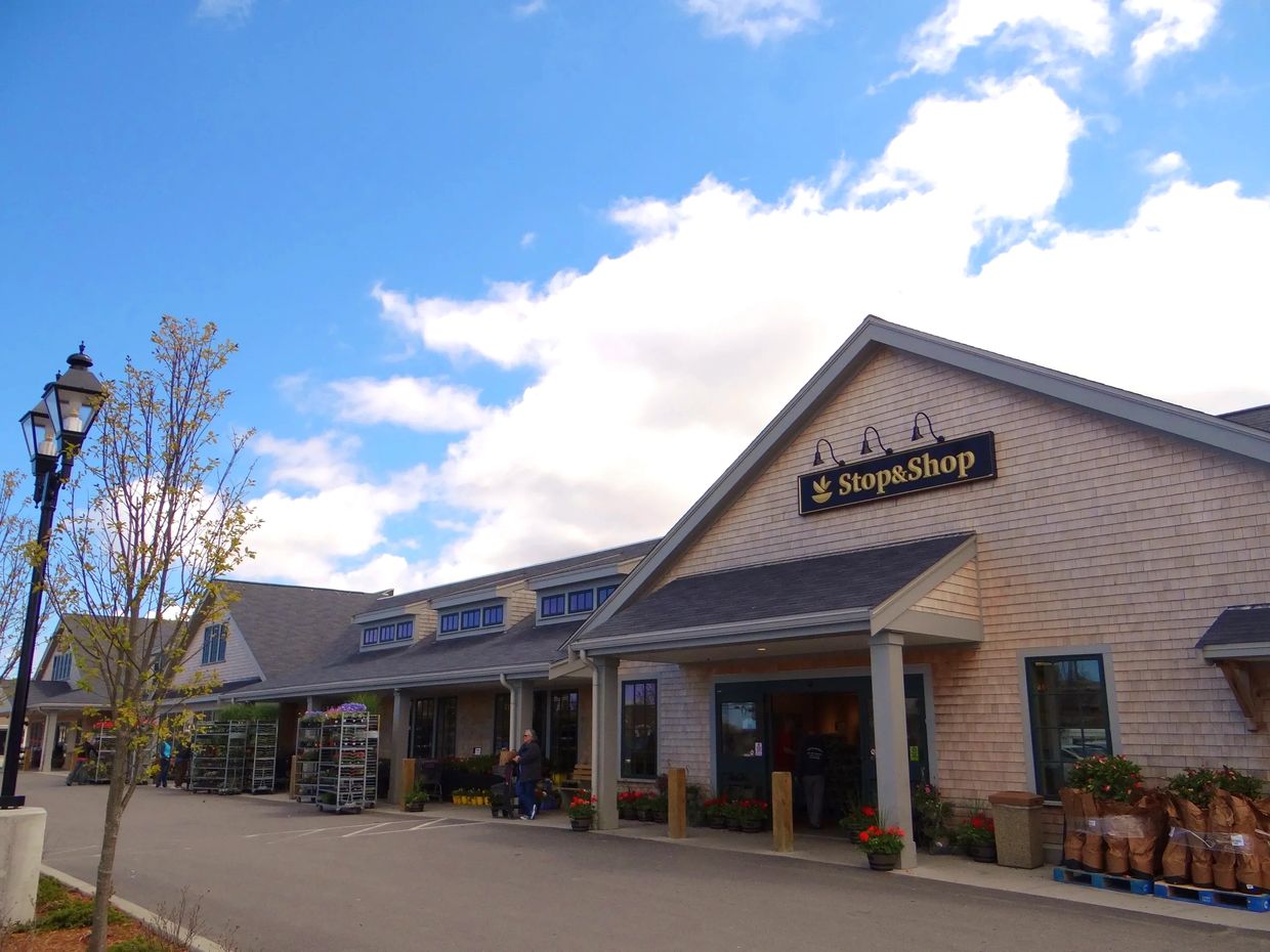 Exterior view of a Stop & Shop grocery store on a sunny day.