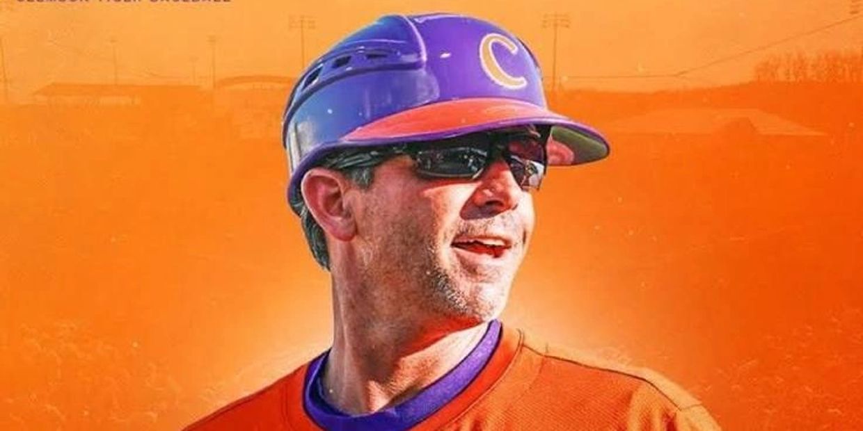 Baseball player wearing purple helmet and orange jersey.