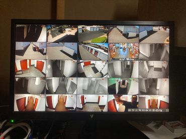 Monitor viewing cameras recording at a Storage units.