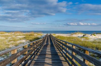 Peaceful beach path in Gulf Shores Alabama representing support and next steps in counseling