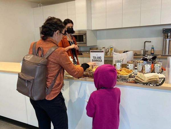 happy customers enjoying a Tea and Bannock Service at Arts Umbrella, September 30th 2022