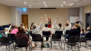 Wellness keynote Speaker Leanne Zaccar talking as guest speaker at Elysia wellness retreat in the hu