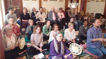 People gathered for a ceremony at the Atlanta Dojo, a Buddhist temple.