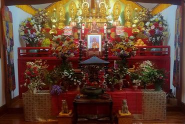 The altar is decorated for the Flower Festival at the Atlanta Dojo, a Buddhist temple.