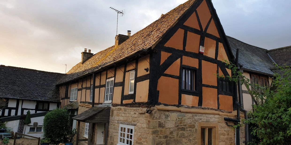 Pointing, Plastering, Restoration & Repairs. Completed half-timbered house.
