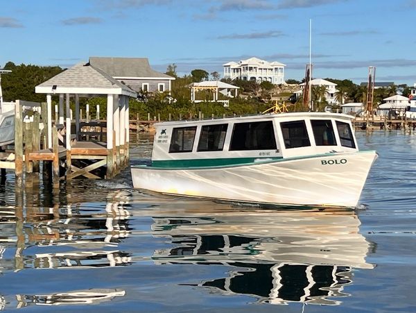 Water taxi near a dock.