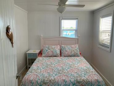 Small bedroom with a double bed.