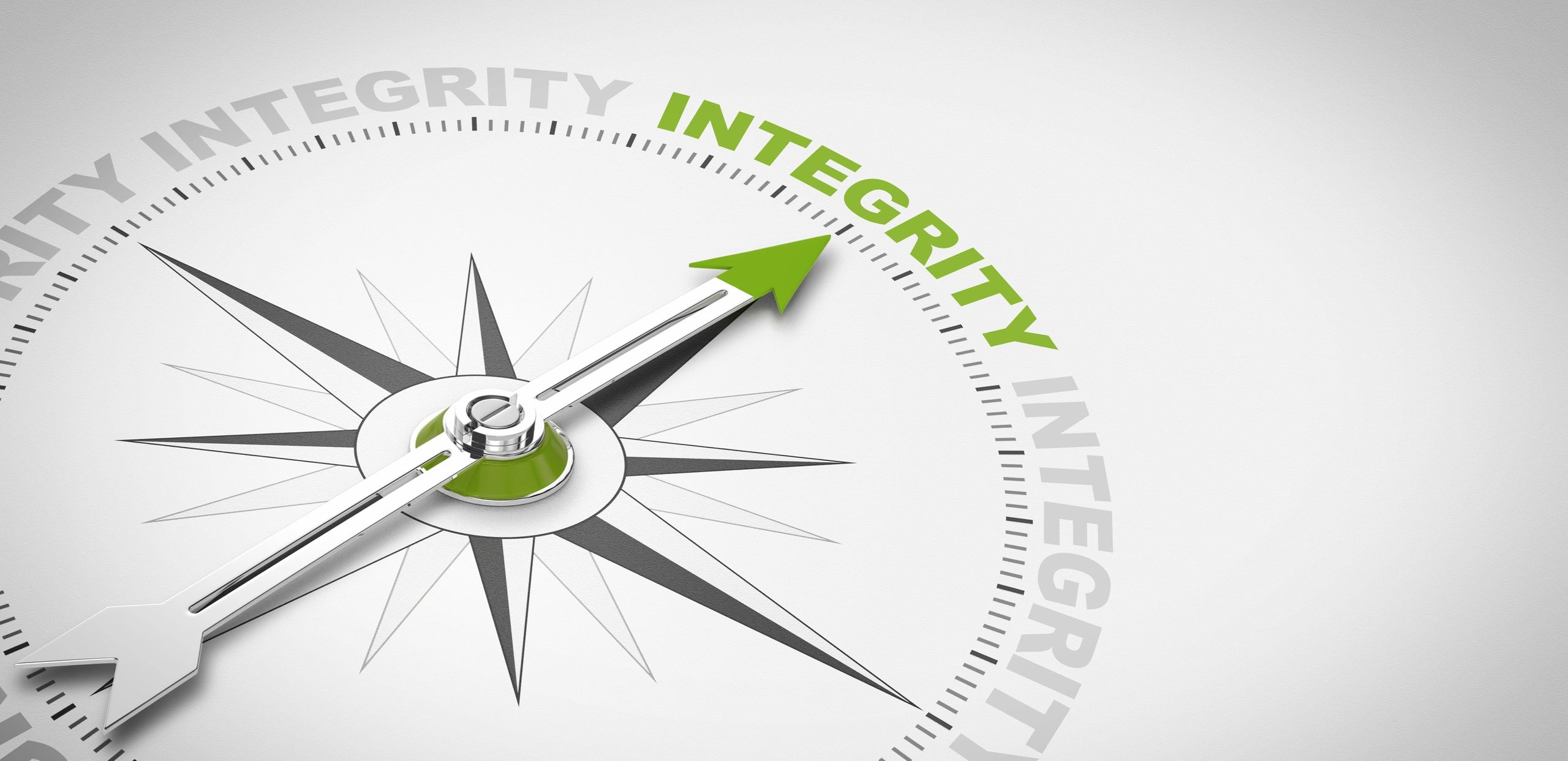 A compass pointing towards the word integrity