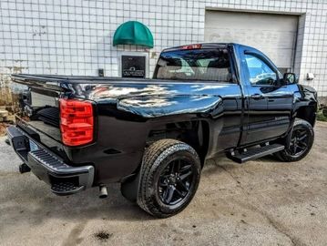 Black Chevy Silverado glowing in System -X Ceramic Protection Max G+