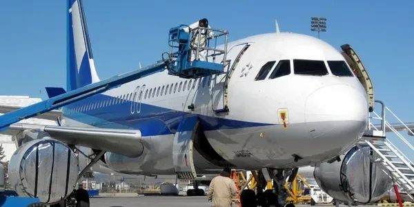 Aircraft maintenance using a lift platform.