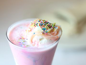 A strawberry shake with sprinkles
