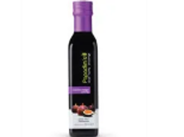 Bottle of pomegranate syrup with purple cap.